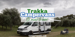 White campervan in a green field with text overlay: Trakka Campervan - so much to love