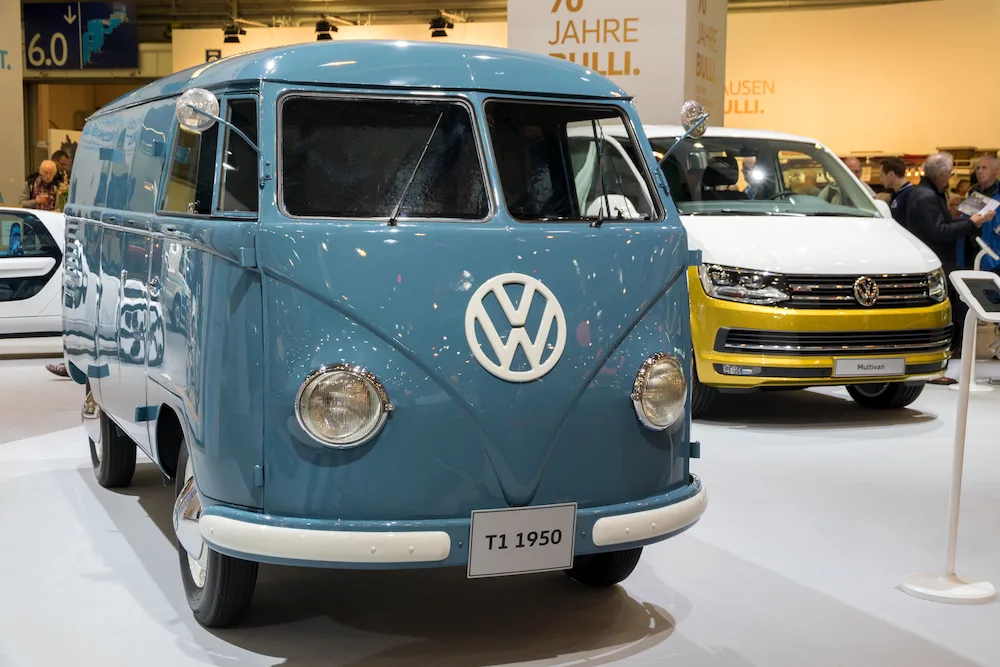 Teal coloured vintage 1950 VW kombi in a show room