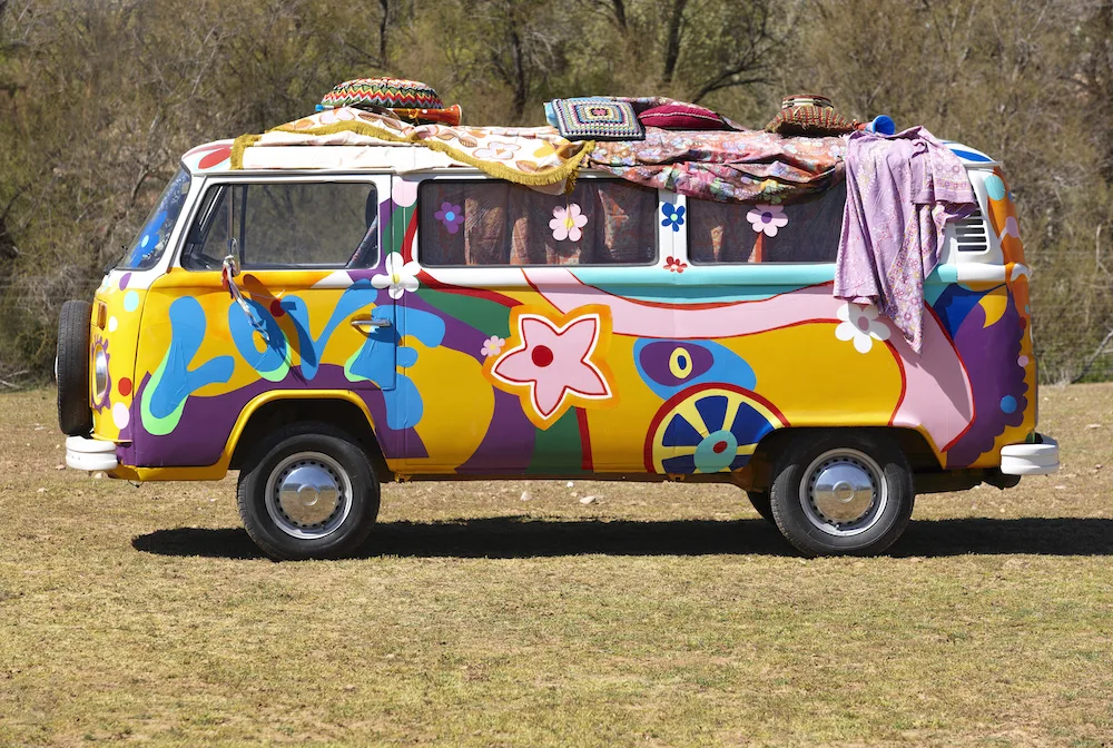 VW campervan painted like a hippie van