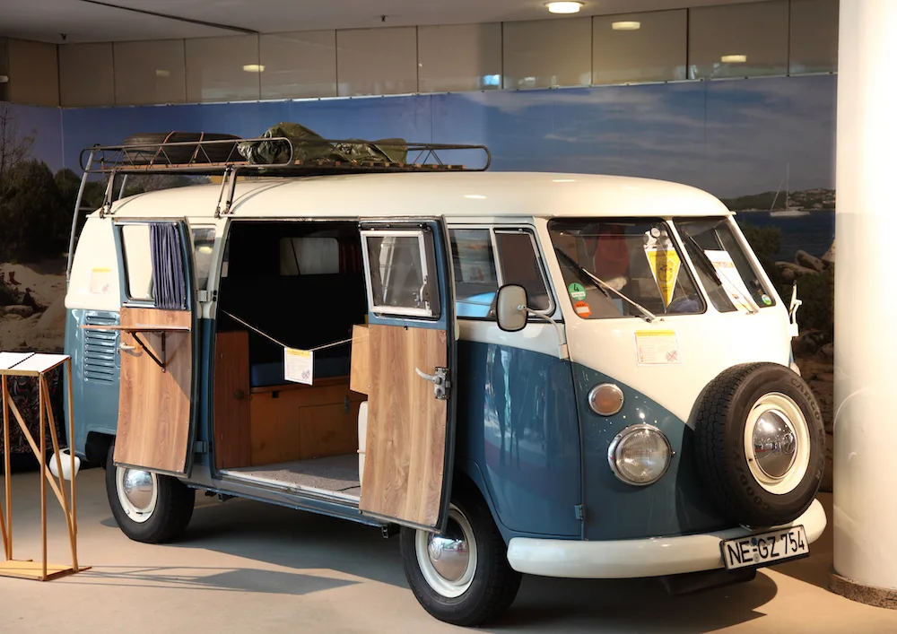 Vintage VW kombi campervan in showroom
