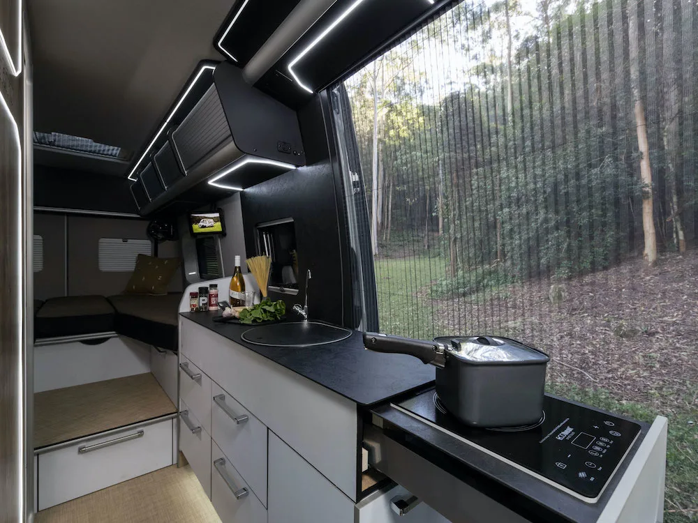 Interior of the Trakka Jabiru J2 4x4 campervan showing the kitchen area.