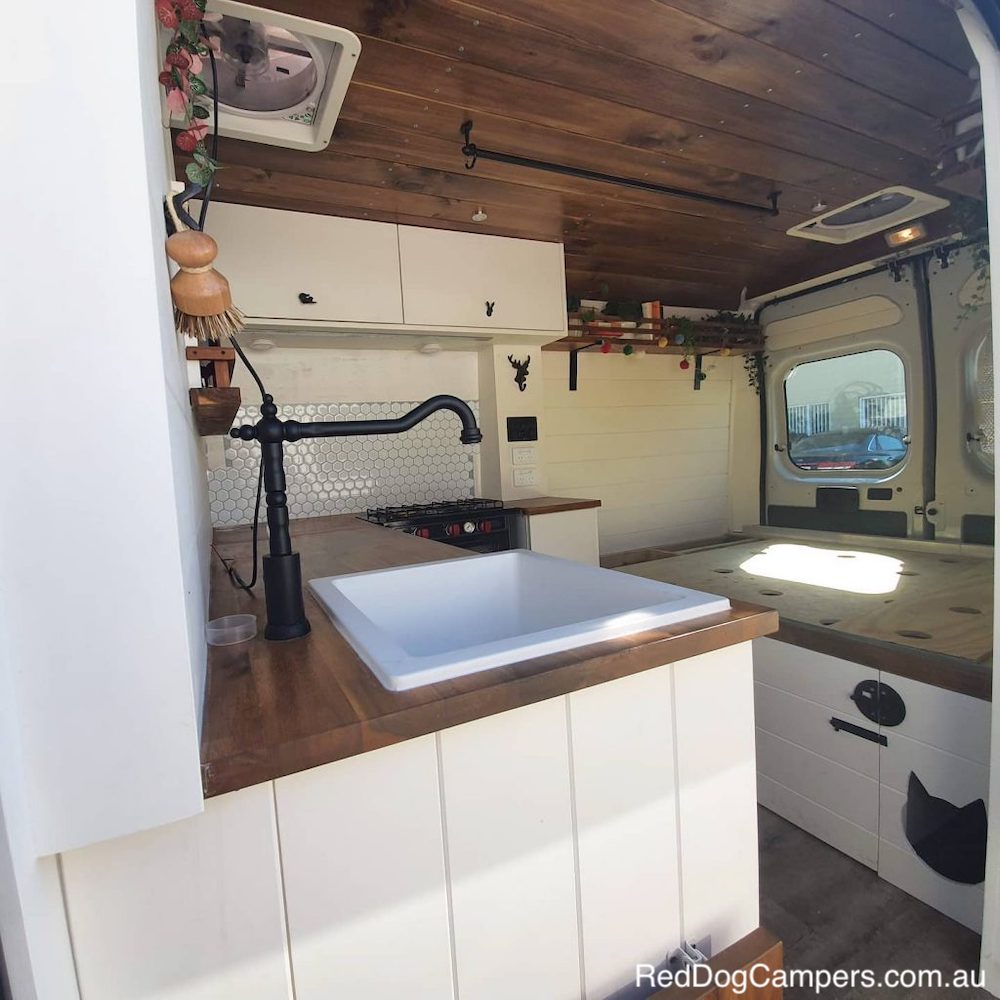Converted compervan with farmhouse style sink.