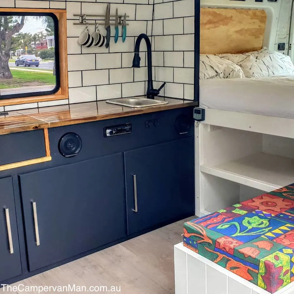 Farmhouse style kitchen inside a VW campervan conversion.