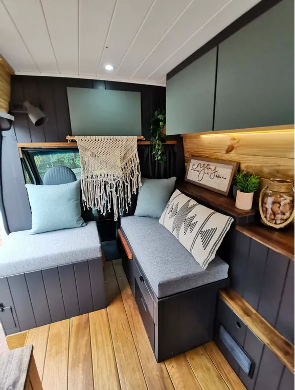 Cozy corner seating in a campervan.