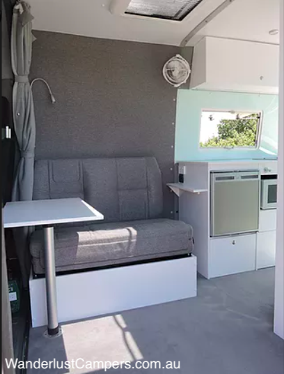 Sitting area of a campervan conversion.