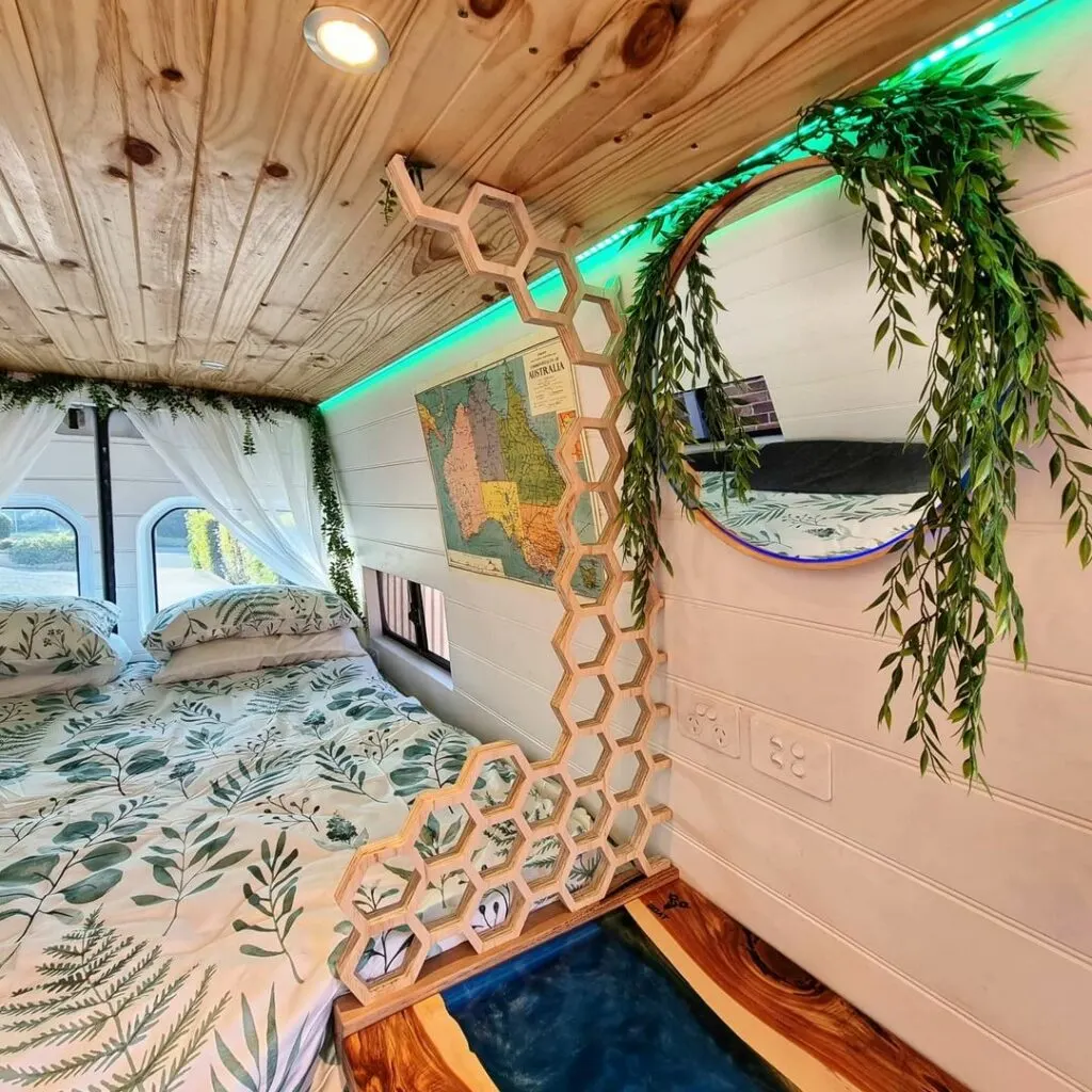 Honeycomb design as a room divider in this Mercedes Sprinter van conversion.