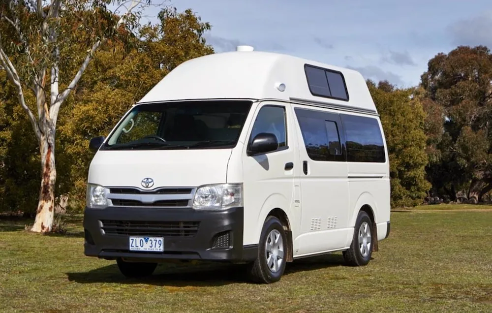 Outside front view of a white Kea Hitop camper van.