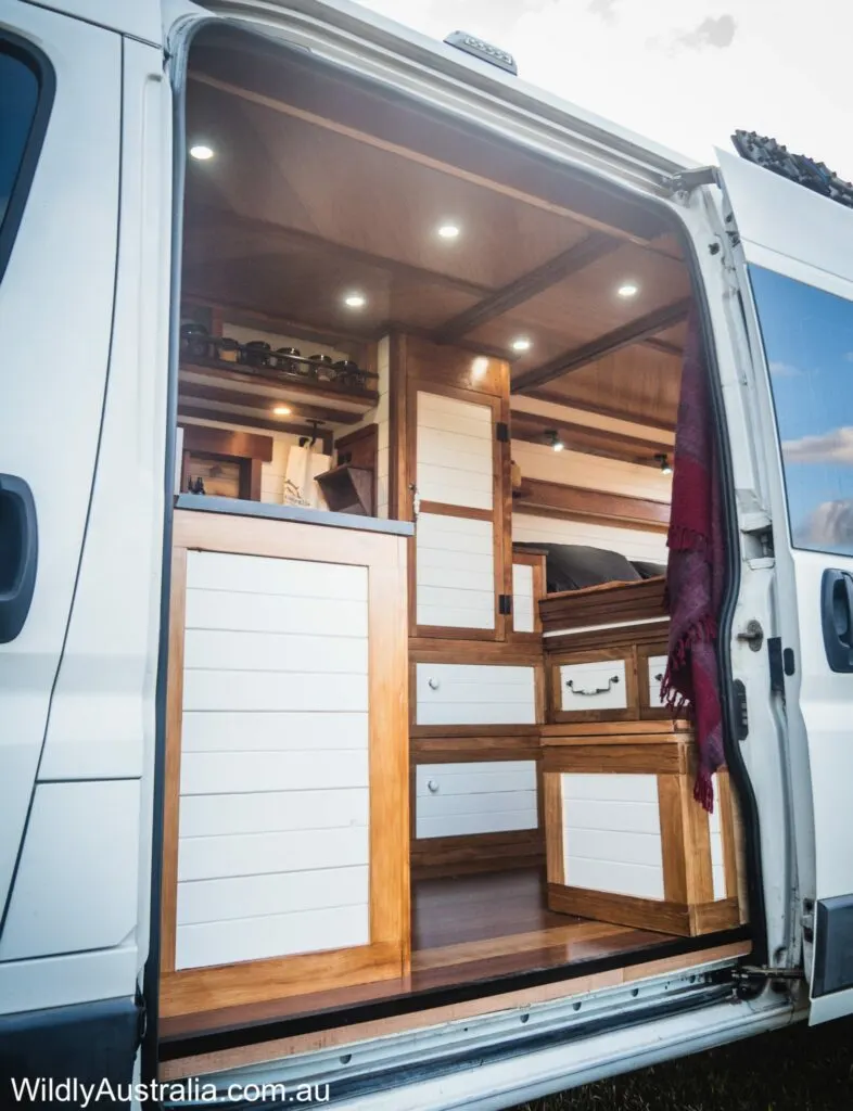Looking in the side door of a van into the converted camper, by Mid North Coast based conversion company, Wildly Australia.