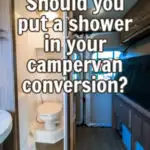 Shower and toilet in the rear of a camper van with text overlay: Should you put a shower in your campervan conversion?