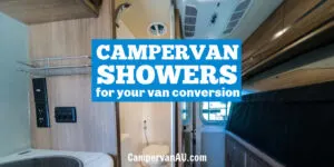 Small shower and toilet in the rear corner of a camper van.