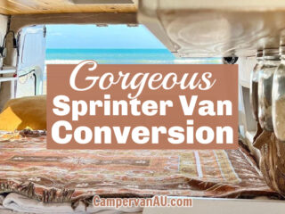 Interior of a campervan looking past the bed in the rear to a beach scene, with text overlay: Gorgeous Sprinter van conversion.