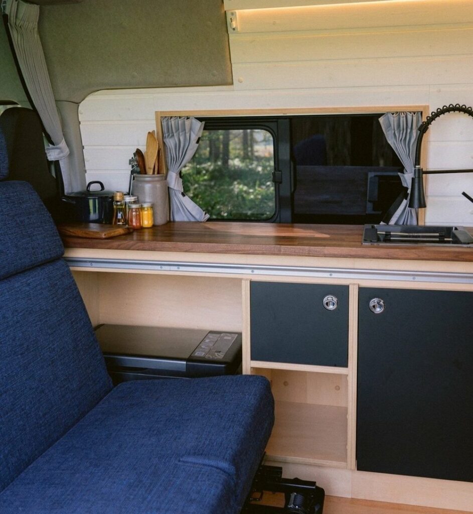 Small kitchen area inside a campervan.